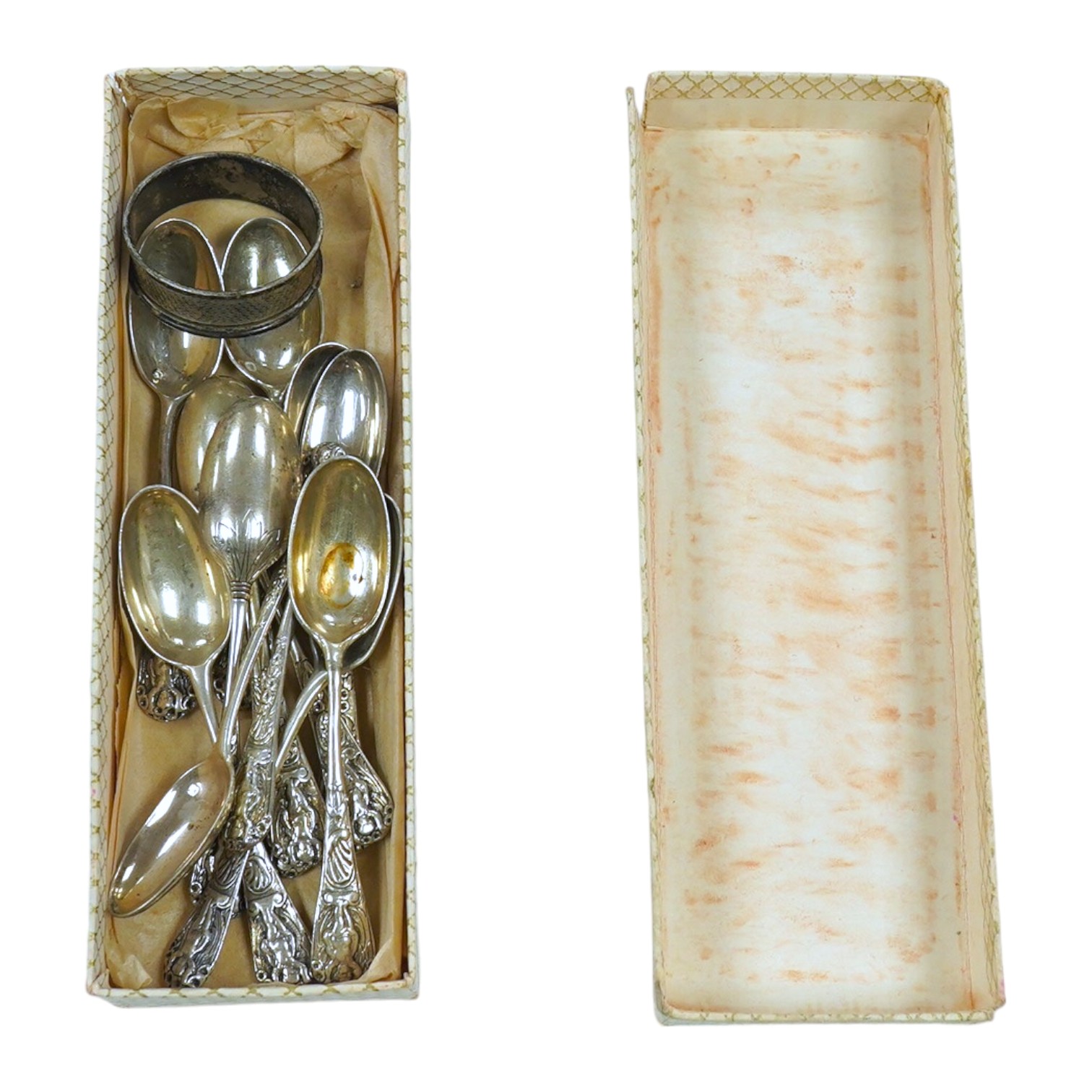 A set of twelve early 20th century French white metal teaspoons and a later silver napkin ring. Condition - poor to fair